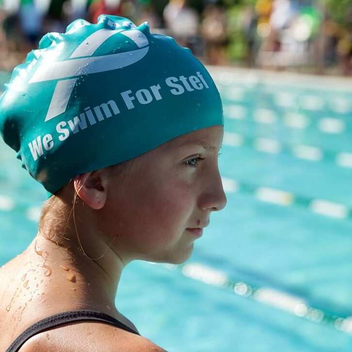 Child with Ovarian Cancer Awareness Swim Cap